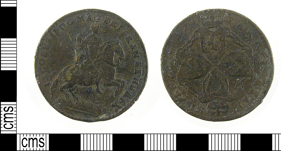 Close-up detail of 1688 American Plantation Tokens design elements and engraving quality