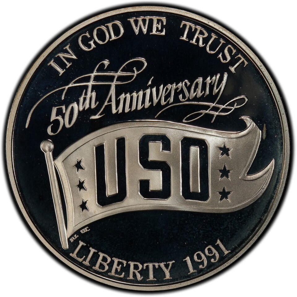 Close-up detail of 1991 USO 50th Anniversary Silver Dollar design elements and engraving quality