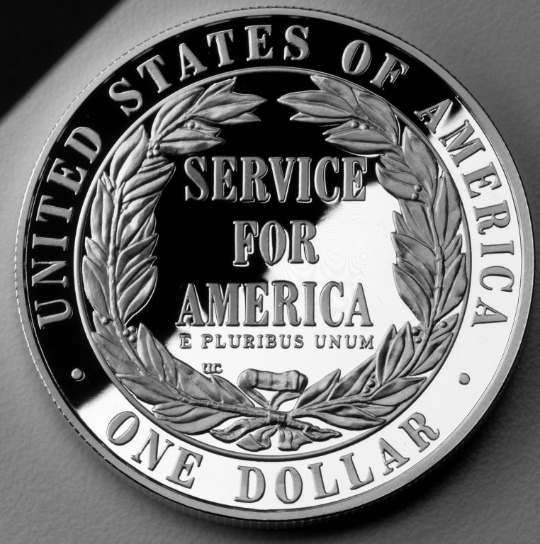Close-up detail of 1996-S National Community Service Silver Dollar design elements and engraving quality