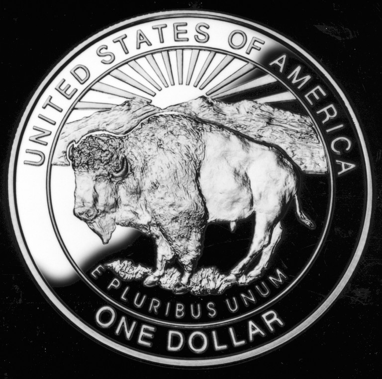 Close-up detail of 1999 Yellowstone National Park Commemorative Silver Dollar design elements and engraving quality