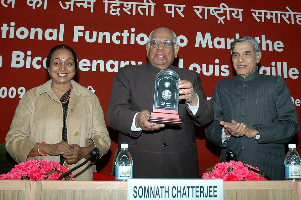 Close-up detail of 2009 Louis Braille Bicentennial Silver Dollar design elements and engraving quality